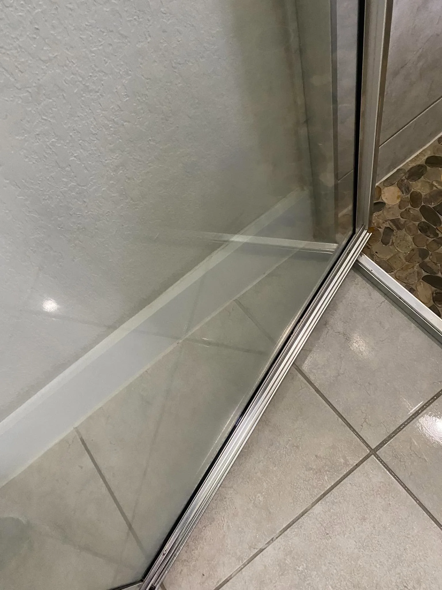 Shower door track after cleaning